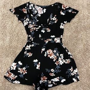 American eagle black short sleeve romper ties in the front
